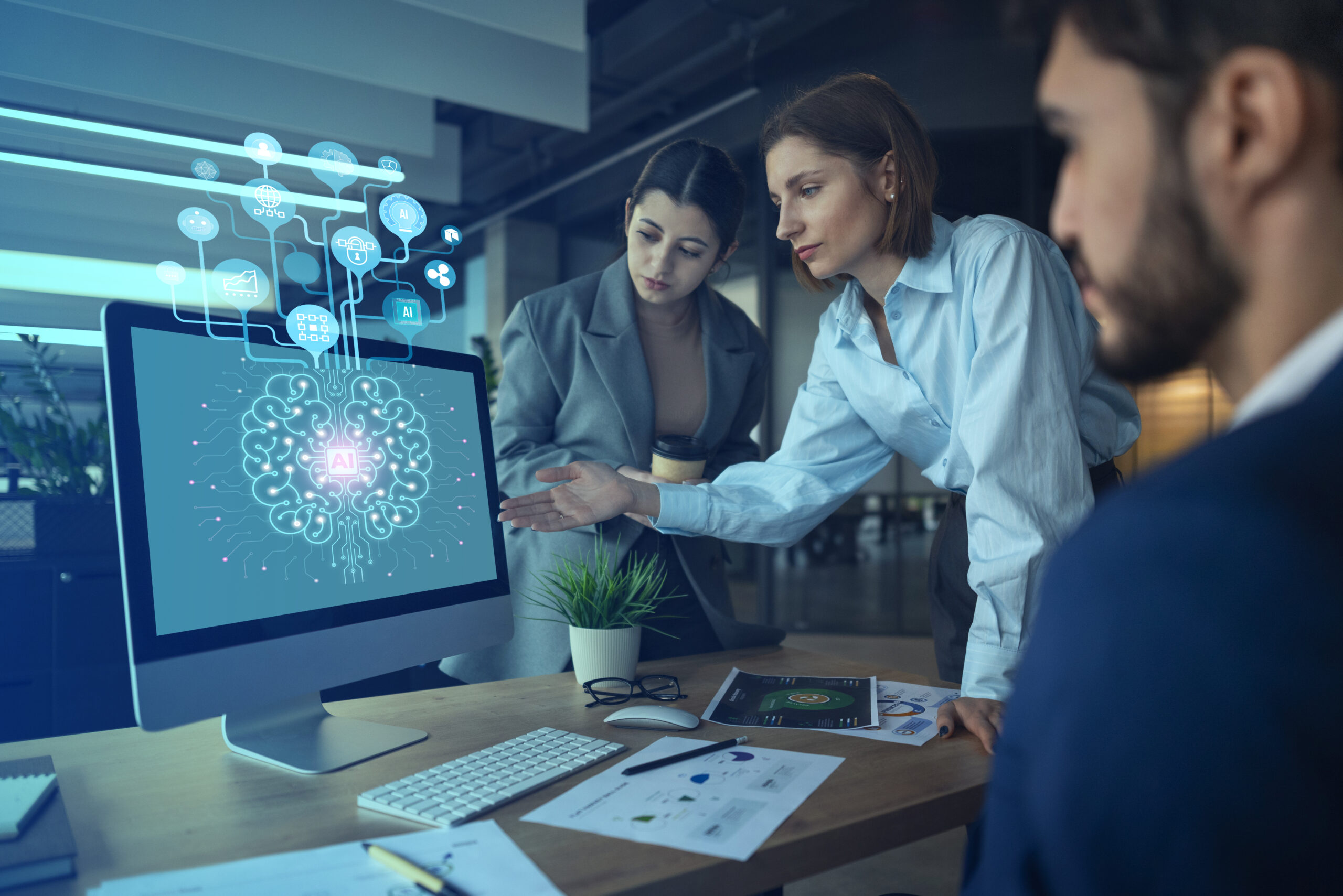 Team analyzing AI interface in a modern tech-focused office setting
